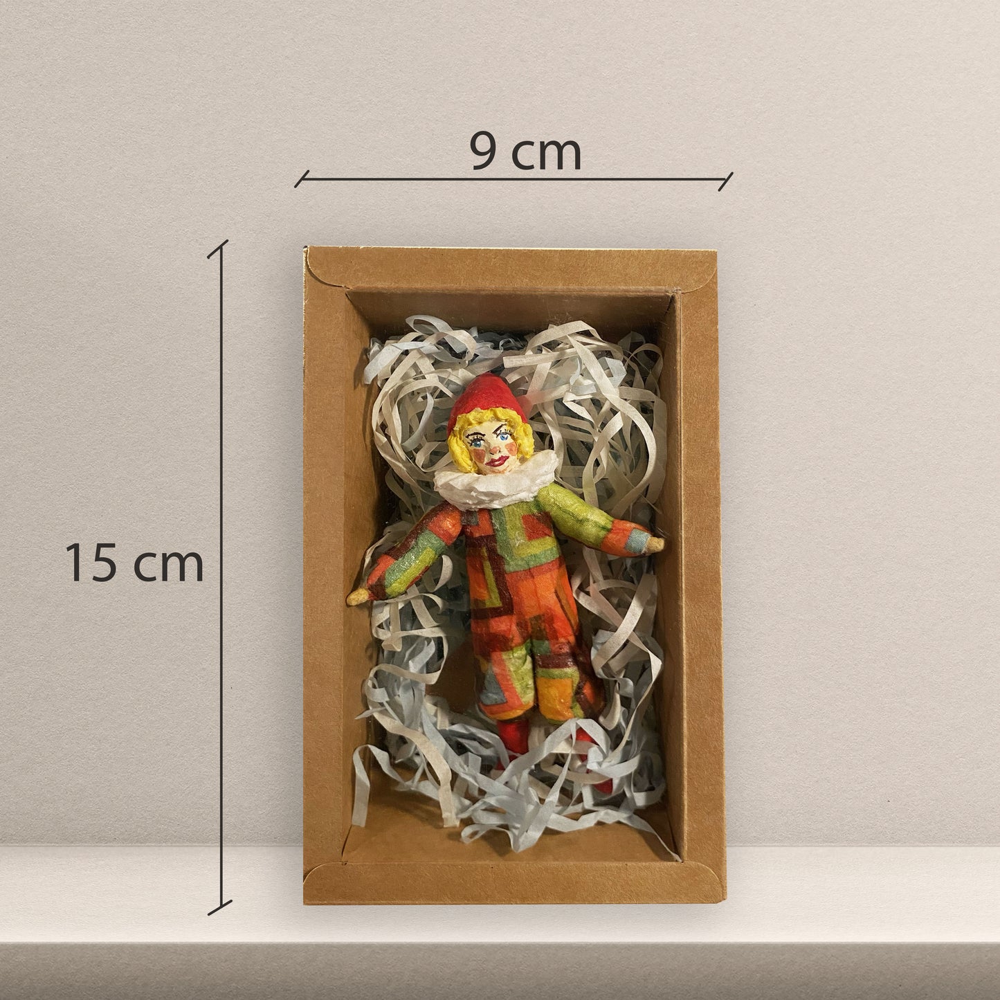 Weihnachtspuppe Harlekin im karierten Kostüm