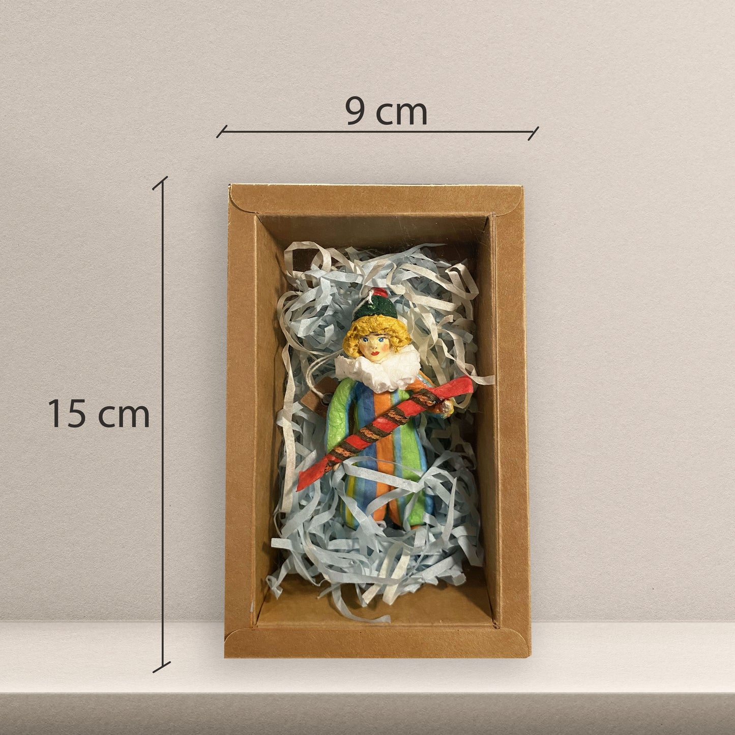 Weihnachtspuppe Clown mit Bonbon