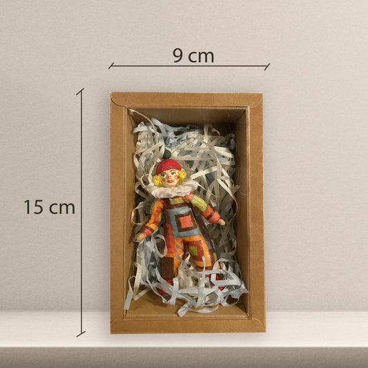 Weihnachtspuppe Harlekin im orangefarben Kostüm