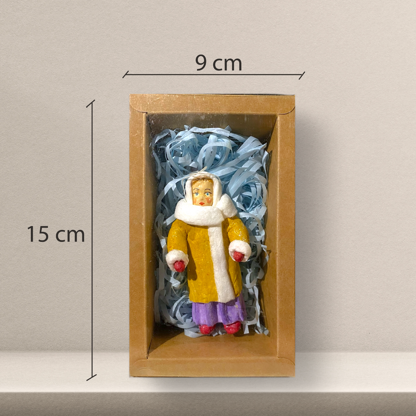 Weihnachtspuppe Junge in Winterkleidung