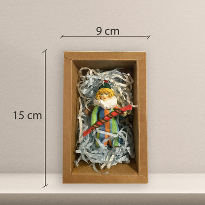 Weihnachtspuppe Clown mit Bonbon